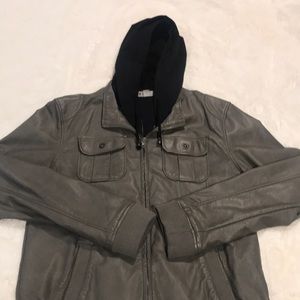 Layered jacket with attached hoodie.